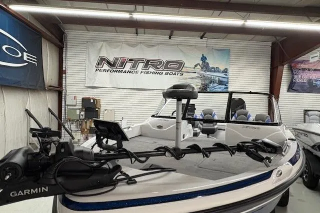 Slide: The Image of 2026 Nitro ZV19 Pro fishing boat in showroom with Garmin equipment. - 8