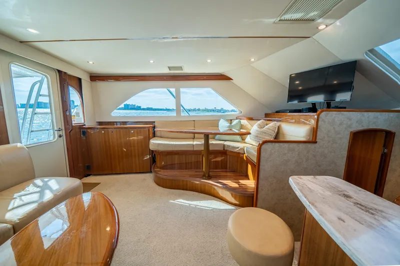 Slide: The Image of Luxurious interior of 2008 Viking 42 Convertible yacht with elegant seating and scenic views. - 32