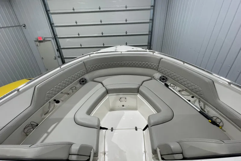 Slide: The Image of Control panel of 2024 Pursuit DC 326 Dual Console boat with Lewmar joystick. - 14