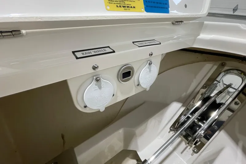 Slide: The Image of 2024 Pursuit DC 326 Dual Console boat with raw and fresh water access. - 31