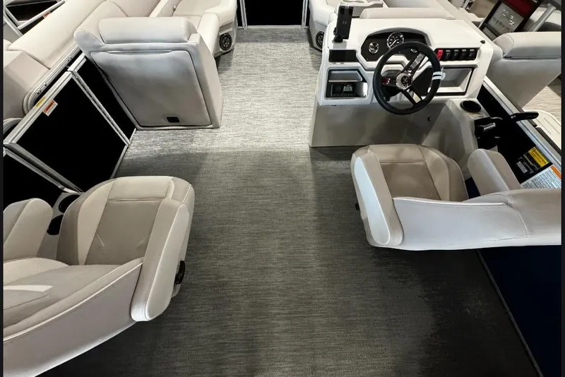 Slide: The Image of Interior of 2026 Godfrey Xperience 2286 SBX Sport Tube, featuring modern seating and steering console. - 5