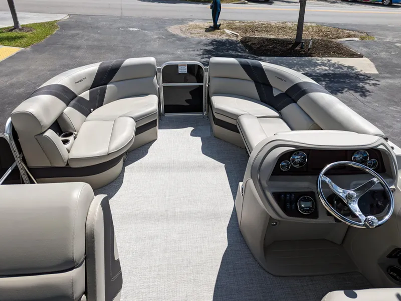 Slide: The Image of 2022 Trifecta 20C LE pontoon boat with spacious seating and modern design. - 8
