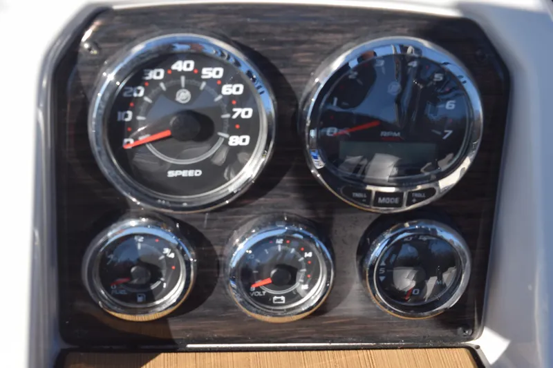 Slide: The Image of Dashboard of 2023 Starcraft SVX 210 IO boat with speedometer and gauges. - 16