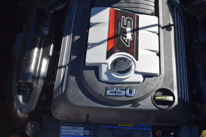 Slide: The Image of 2023 Starcraft SVX 210 IO engine, featuring a 4.5L MerCruiser 250 horsepower. - 26