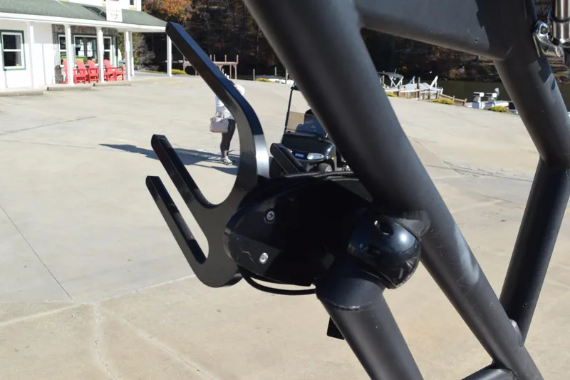 Slide: The Image of Close-up of a 2023 Starcraft SVX 210 IO boat accessory on a dock. - 31