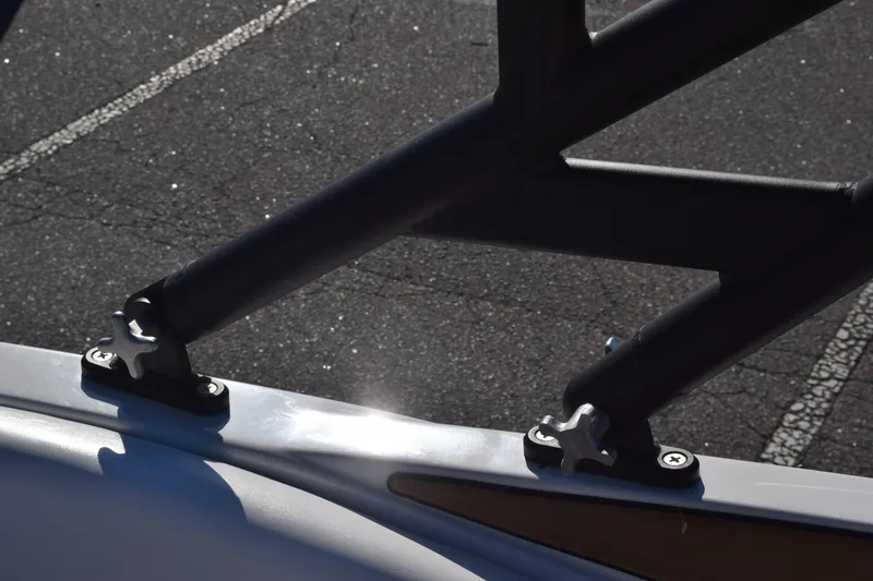 Slide: The Image of 2023 Starcraft SVX 210 IO boat detail, showing metal fittings and railing. - 36