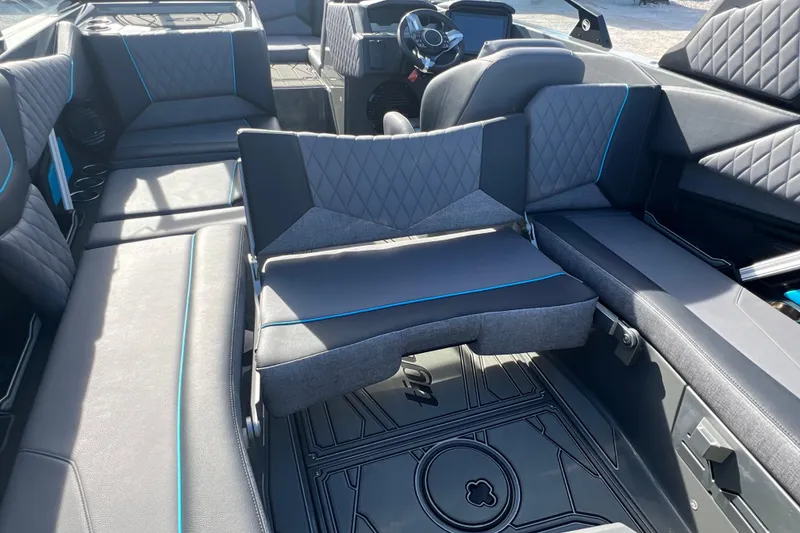 Slide: The Image of 2026 Tigé Z3 boat interior with luxurious seating and modern design. - 12