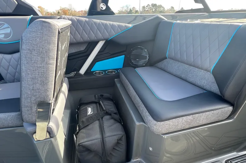 Slide: The Image of 2026 Tigé Z3 boat interior with stylish seating and storage bag. - 14