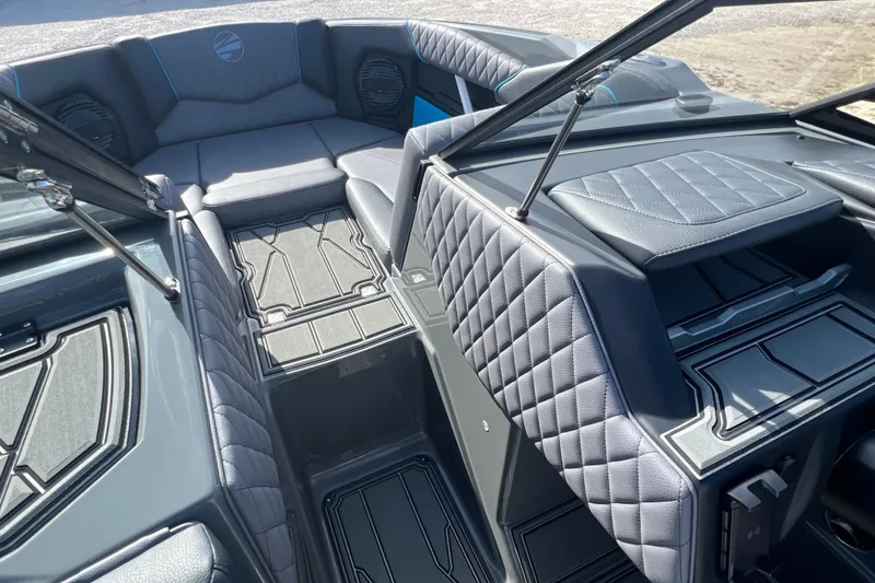 Slide: The Image of 2026 Tigé Z3 boat interior with quilted seats and modern design. - 18