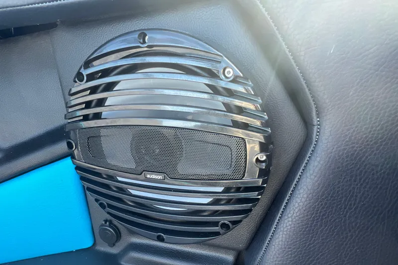 Slide: The Image of Close-up of Audison speaker in 2026 Tigé Z3 boat interior. - 22