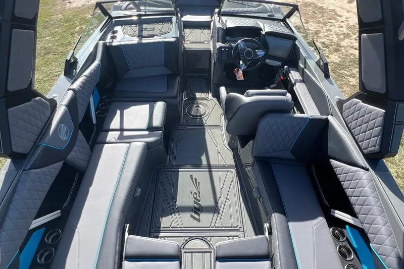 Slide: The Image of Luxurious interior of 2026 Tigé Z3 boat with modern seating and sleek design. - 9