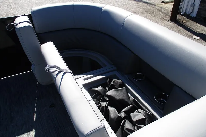 Slide: The Image of 2026 Bentley Pontoons Legacy 223 Swingback interior seating with cup holders. - 14