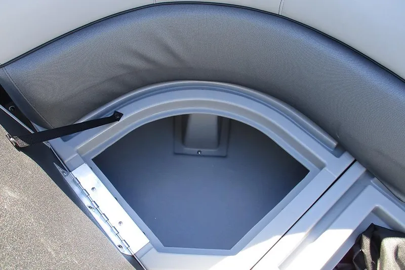 Slide: The Image of 2026 Bentley Pontoons Legacy 223 Swingback storage compartment with cushioned seating. - 16