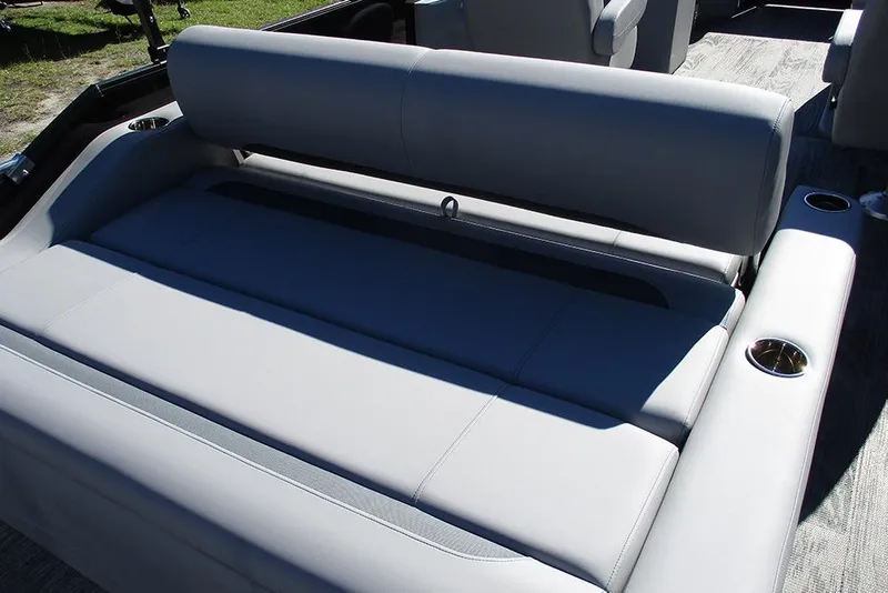 Slide: The Image of 2026 Bentley Pontoons Legacy 223 Swingback interior seating with cup holders. - 19