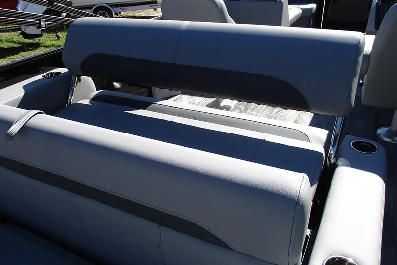 Slide: The Image of 2026 Bentley Pontoons Legacy 223 Swingback interior seating with cup holders. - 21