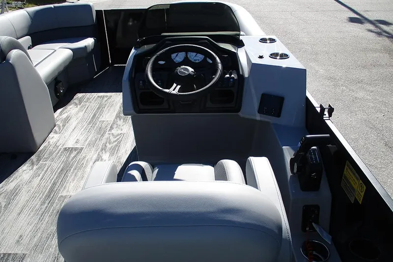Slide: The Image of 2026 Bentley Pontoons Legacy 223 Swingback interior with steering console and seating. - 23