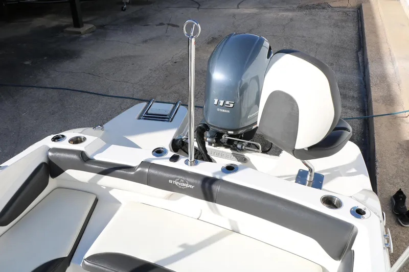 Slide: The Image of 2018 Stingray 182 SC boat with Yamaha 115 engine, rear seating view. - 26