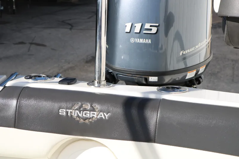 Slide: The Image of 2018 Stingray 182 SC boat with Yamaha 115 outboard motor. - 31