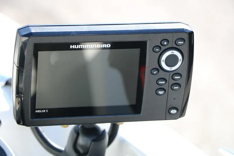 Slide: The Image of Humminbird Helix 5 fish finder on 2018 Stingray 182 SC boat dashboard. - 33