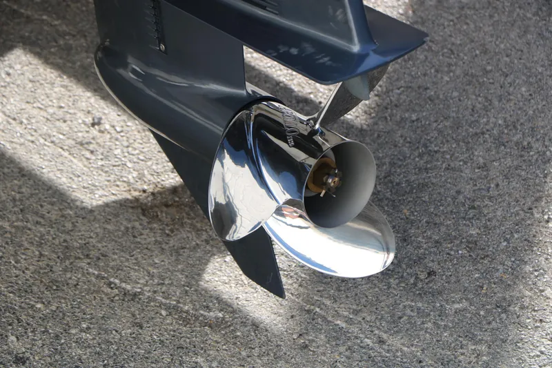 Slide: The Image of Close-up of a 2018 Stingray 182 SC boat propeller on concrete surface. - 7