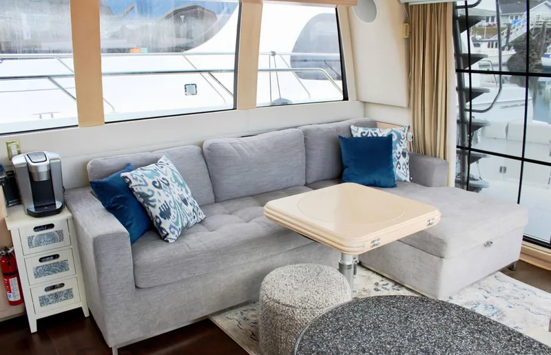 Slide: The Image of Luxurious interior of 2000 Carver 530 Voyager Pilothouse with cozy seating and modern decor. - 4