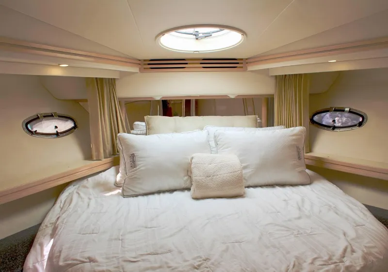 Slide: The Image of Luxurious bedroom interior of 2000 Carver 530 Voyager Pilothouse yacht. - 8