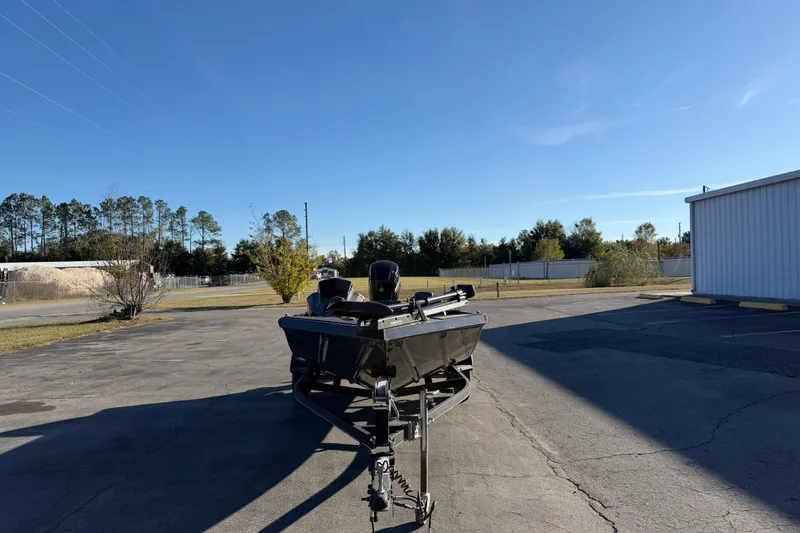 Slide: The Image of 2022 Ranger RT178 boat parked outdoors on a sunny day. - 3