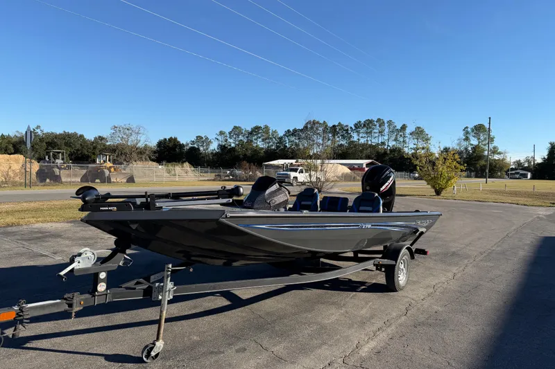 Slide: The Image of 2022 Ranger RT178 boat on trailer in outdoor setting. - 4