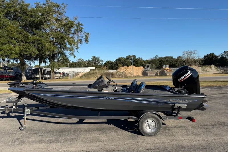 Slide: The Image of 2022 Ranger RT178 boat with Mercury engine on trailer, parked outdoors. - 5