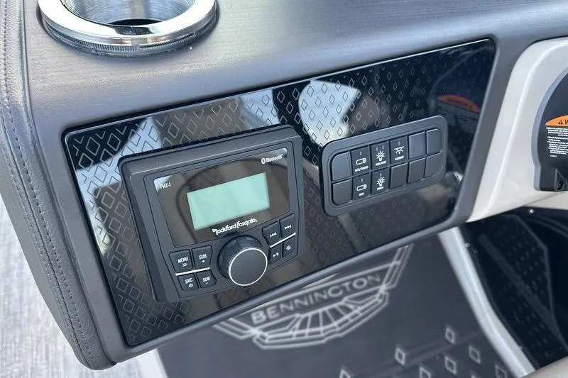 Slide: The Image of Control panel of 2026 Bennington M Quad Bench 22 MFB with audio system and switches. - 19