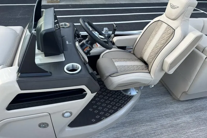 Slide: The Image of Luxurious interior of 2026 Bennington M Quad Bench 22 MFB boat with plush seating. - 20