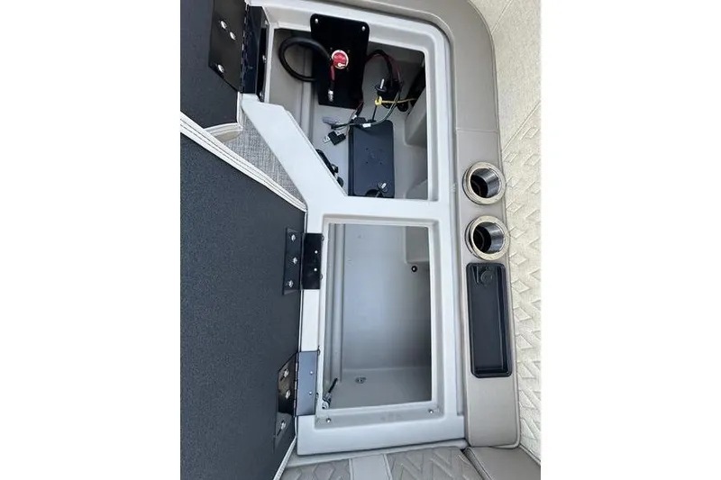 Slide: The Image of Interior view of 2026 Bennington M Quad Bench 22 MFB storage compartment. - 27