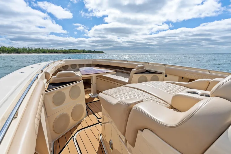 Slide: The Image of Luxurious 2023 HCB 53 Suenos RXV boat interior with elegant seating and ocean view. - 27