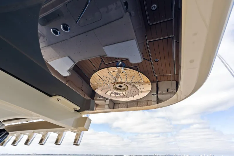 Slide: The Image of 2023 HCB 53 Suenos RXV boat ceiling with wood finish and lighting fixtures. - 32