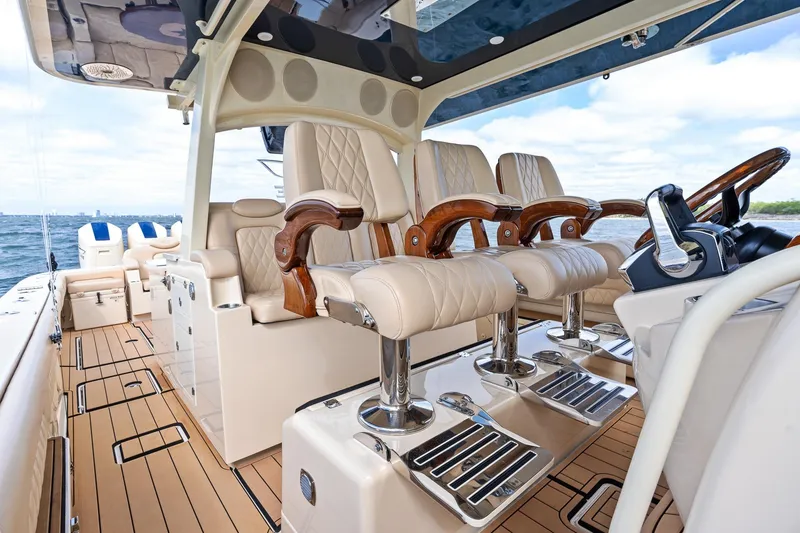 Slide: The Image of Luxurious interior of 2023 HCB 53 Suenos RXV boat with plush seating and elegant design. - 9
