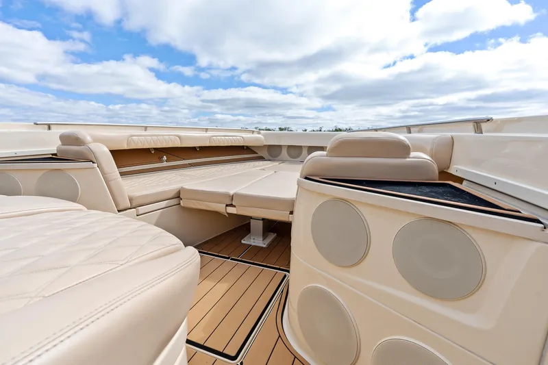 Slide: The Image of Luxurious interior of 2023 HCB 53 Suenos RXV boat with beige seating and wood flooring. - 18