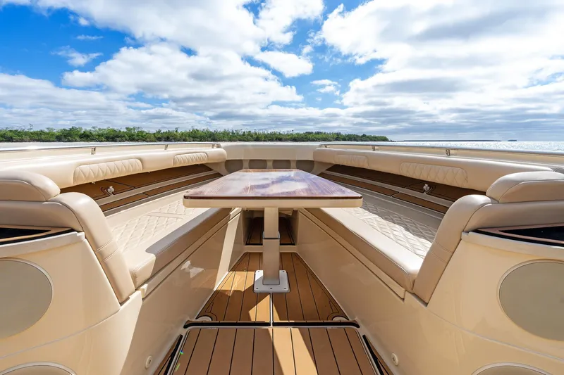 Slide: The Image of Luxurious interior of 2023 HCB 53 Suenos RXV boat with elegant seating and table. - 29