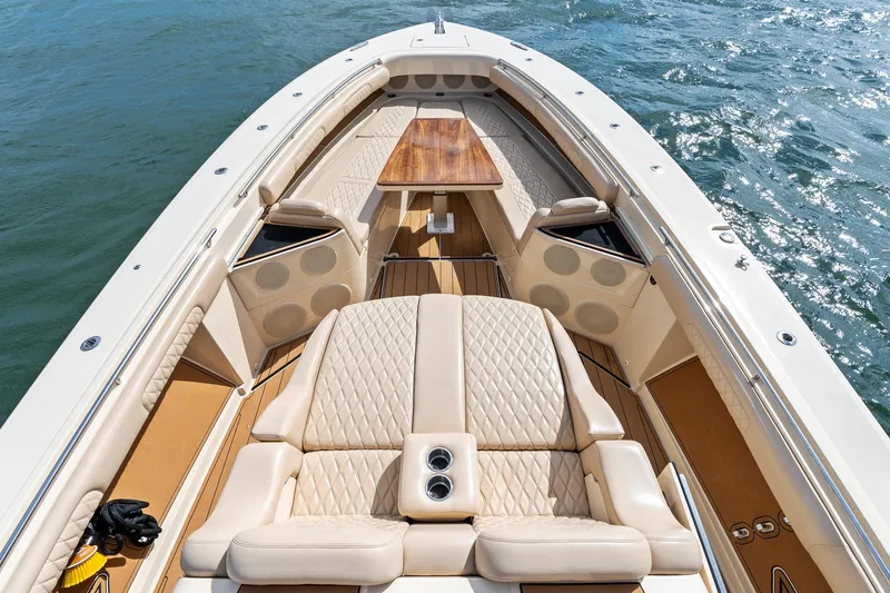 Slide: The Image of Luxurious 2023 HCB 53 Suenos RXV boat interior with plush seating and elegant design. - 31