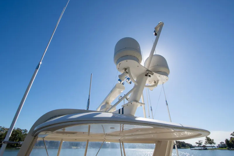 Slide: The Image of Radar equipment on a 2015 Fleming 55 yacht under clear blue sky. - 34