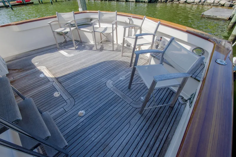 Slide: The Image of Spacious deck of 2015 Fleming 55 yacht with seating, overlooking water. - 39