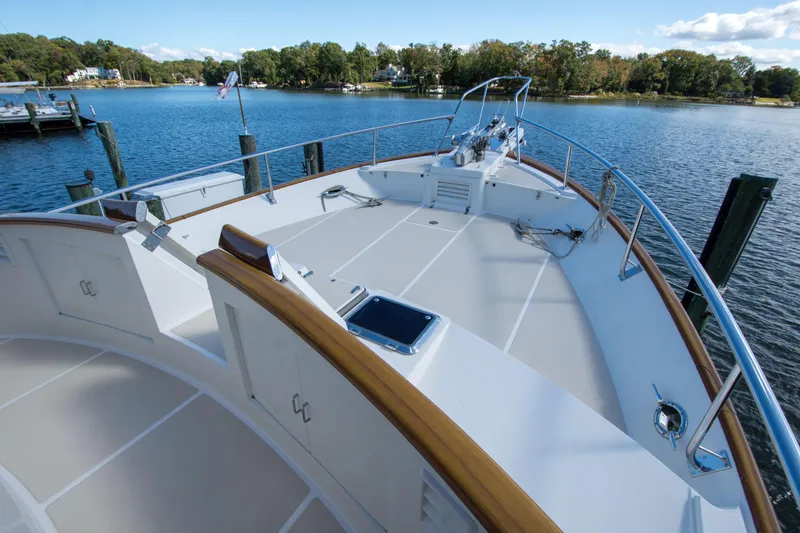 Slide: The Image of 2015 Fleming 55 yacht deck with scenic waterfront view. - 44