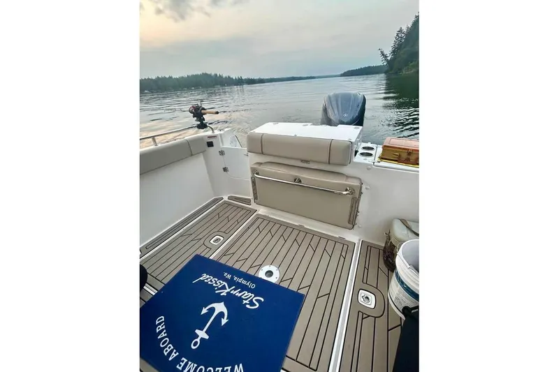 Slide: The Image of 2025 Cutwater C-248 Coupe boat on trailer, close-up of bow and winch system. - 17