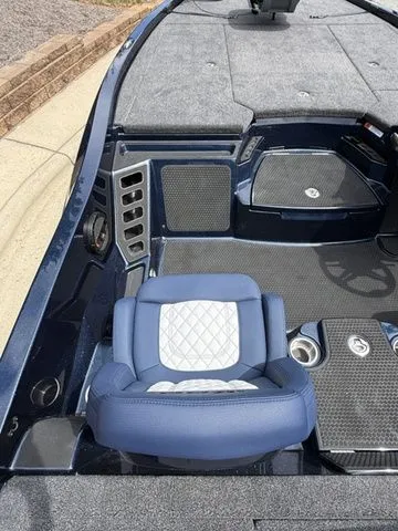 Slide: The Image of 2026 Ikon Boats LXE20 interior with blue and white seating, modern design, and spacious layout. - 7