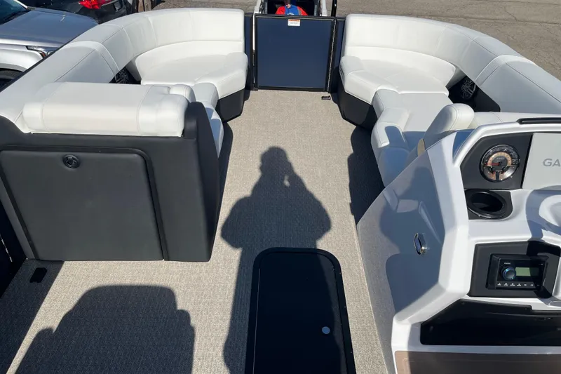 Slide: The Image of Luxurious 2026 Evotti 523CS boat interior with plush seating and modern dashboard. - 11