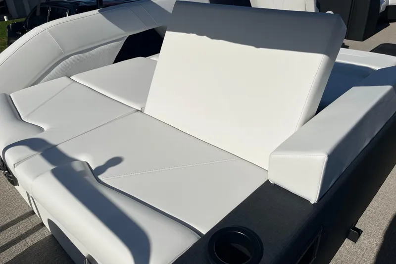Slide: The Image of Luxurious white seating on 2026 Evotti 523CS boat, featuring cup holders and modern design. - 15