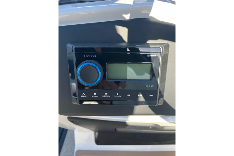 Slide: The Image of Control panel of a 2026 Evotti 523CS with Clarion Bluetooth audio system. - 27