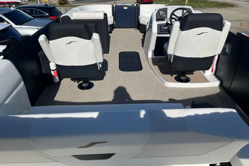 Slide: The Image of Interior of 2026 Evotti 523CS boat with modern seating and steering console. - 3