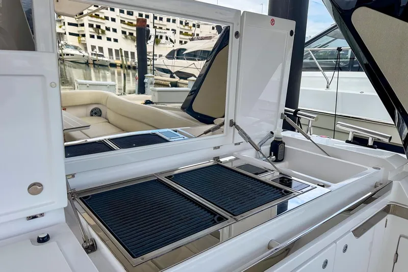Slide: The Image of Outdoor kitchen on 2023 Azimut Verve 47 yacht with grill and seating area. - 4