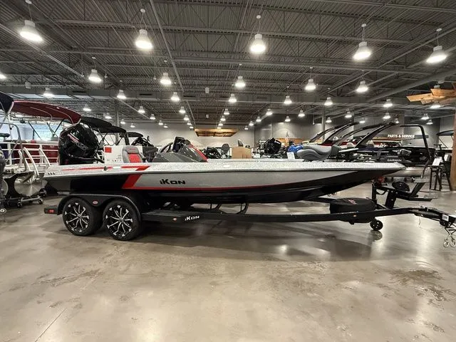 The Image of 2026 Ikon Boats LXE20 in showroom, sleek design, modern features, on trailer. - 1