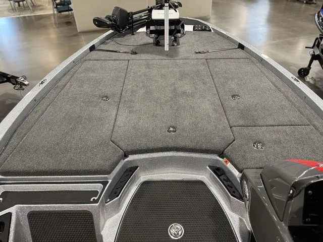 Slide: The Image of 2026 Ikon Boats LXE20 deck, spacious and carpeted, ideal for fishing and leisure activities. - 12